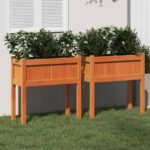 Jardinières 2 pcs avec pieds cire marron bois de pin massif