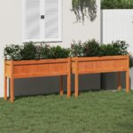 Jardinières 2 pcs avec pieds cire marron bois de pin massif