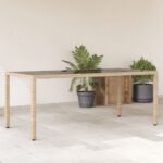 Table de jardin avec dessus en verre beige résine tressée